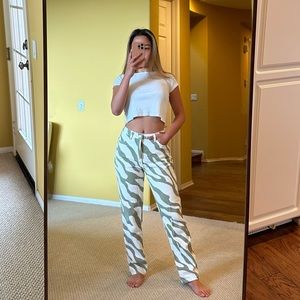 Green zebra print high waisted jeans